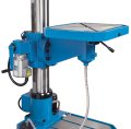 Drill table with motorized height adjustment