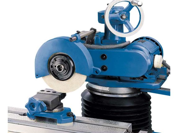 Surface grinder with angular adjustable vise