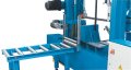 Solid feed roller table and material guide for workpiece bundles